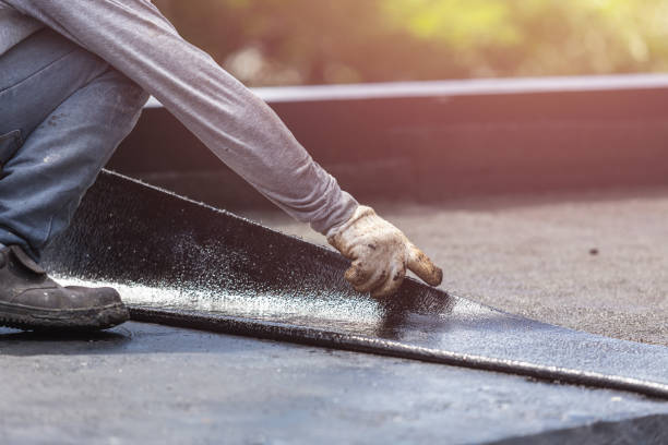 Professional Basement Waterproofing technician working in Chalmers, IN